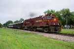 AM 68 leads an excursion train south out of Springdale 